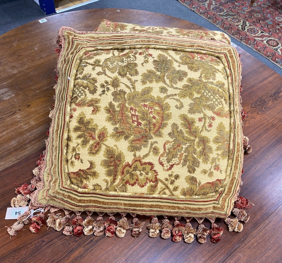 Three square tasselled cushions 56cm